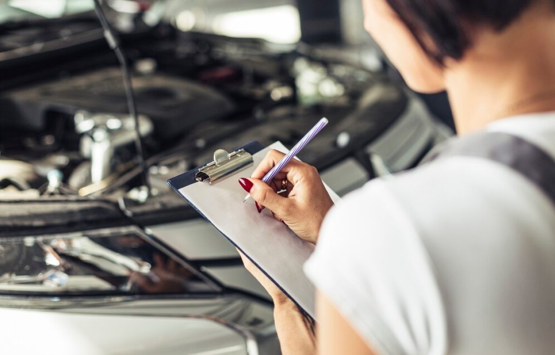 high-angle-woman-feeling-car-service-form_23-2148327558